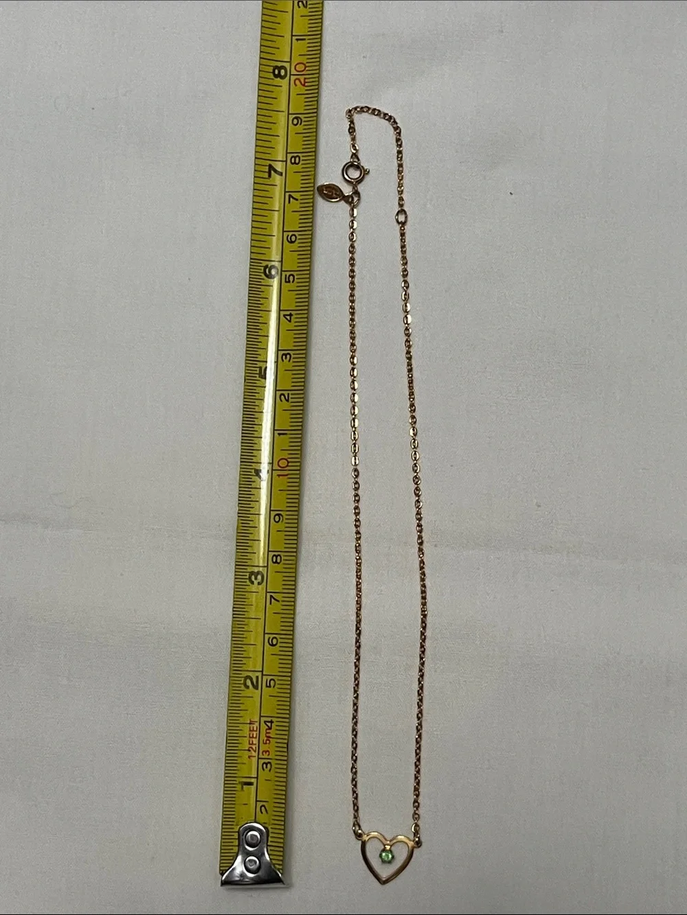 Avon gold tone